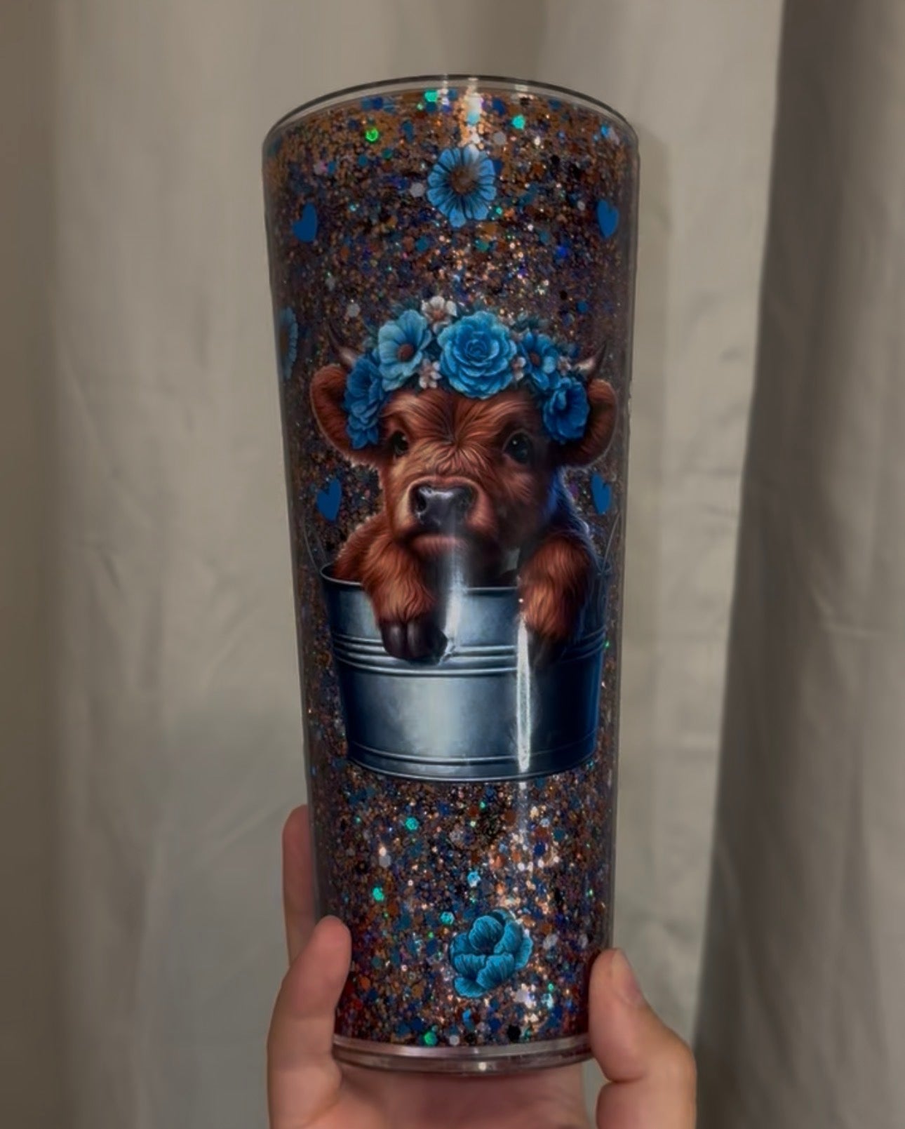 blue flowers cow