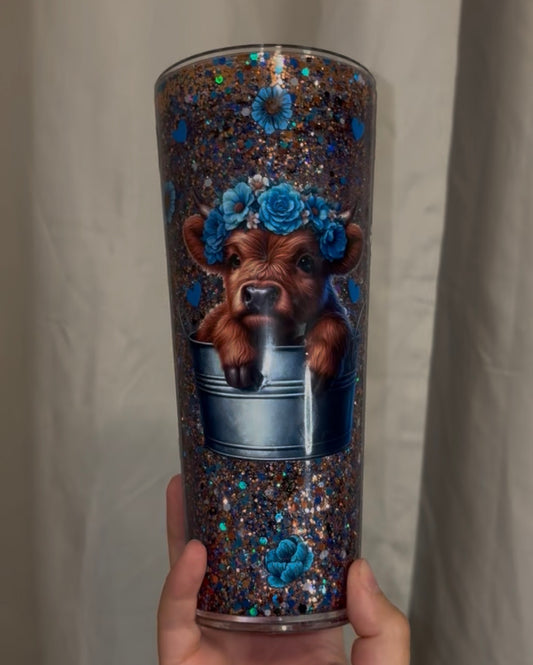 blue flowers cow